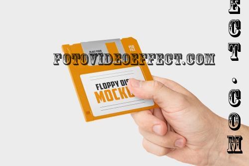 Hand Holding Floppy Disk Mockup - 290923727 - TFZCCPT